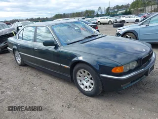 2000 BMW 7 Series 740iL with VIN WBAGH8343YDP13075, listed as a IAAI auction lot 42050589 with 999,999 mi miles. Bid and sale history available at carsss.com. Image 1.