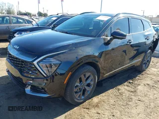 2023 Kia Sportage SX-Prestige with VIN KNDPXCAGXP7035895, listed as a IAAI auction lot 41335448 with 74,272 mi miles and . Bid and sale history available at DreamBid. Image 2.