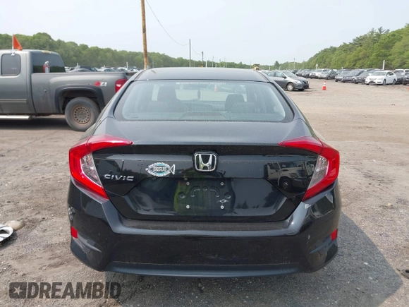 2017 Honda Civic LX z VIN 2HGFC2F50HH539680, wystawiony jako IAAI lot #42434762 z przebiegiem 112 572 mil mil oraz . Historia ofert i sprzedaży dostępna na DreamBid. Obrazek 16.