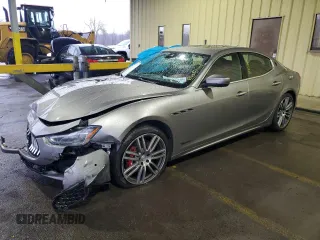 2018 Maserati Ghibli S Q4 GranLusso with VIN ZAM57YTL4J1280311, listed as a Copart auction lot 83318394 with 68,429 mi miles and Salvage Title. Bid and sale history available at carsss.com. Image 1.
