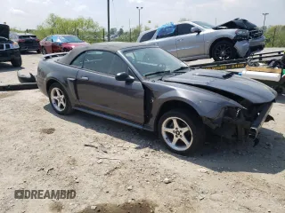 2003 Ford Mustang GT Deluxe with VIN 1FAFP45X43F387520, listed as a Copart auction lot 56302185 with 134,537 mi miles and Salvage title. Bid and sale history available at DreamBid. Image 4.