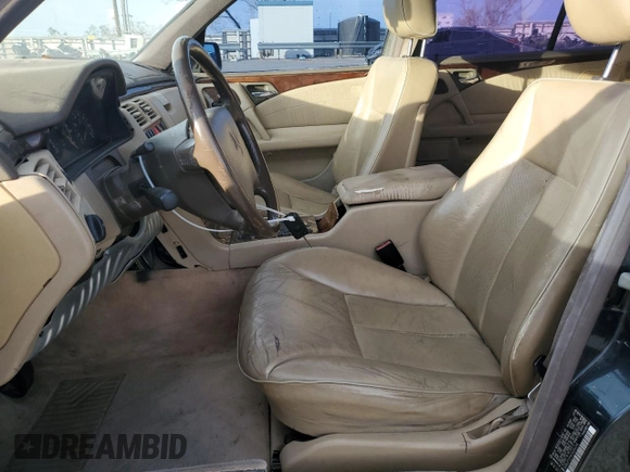 1997 Mercedes-Benz E-Class with VIN WDBJF72F8VA204316, listed as a Copart auction lot 84684614 with 203,748 mi miles and Salvage Title. Bid and sale history available at carsss.com. Image 7.