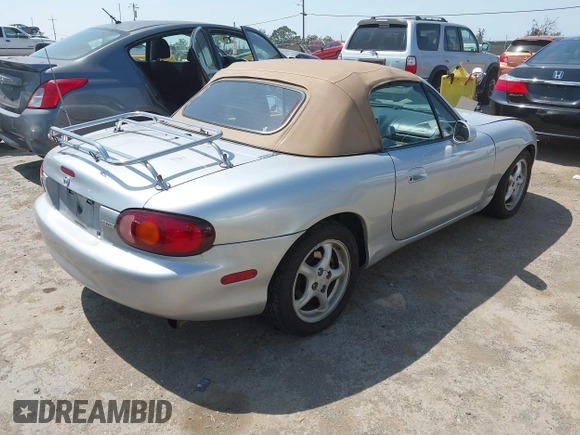 1999 Mazda MX-5 Miata with VIN JM1NB3539X0131393, listed as a IAAI auction lot 42439850 with 210,710 mi miles and . Bid and sale history available at DreamBid. Image 4.