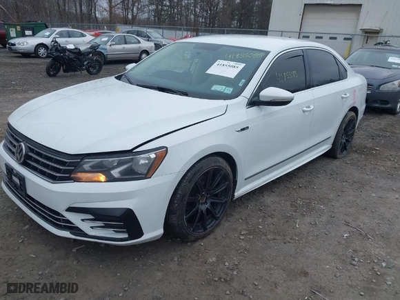 2017 Volkswagen Passat R-Line w/Comfort Pkg with VIN 1VWDT7A32HC016590, listed as a IAAI auction lot 41855085 with 166,089 mi miles. Bid and sale history available at carsss.com. Image 2.