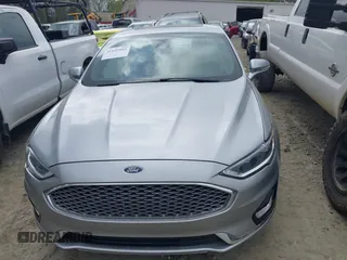 2020 Ford Fusion Titanium с VIN 3FA6P0K91LR128016, выставлен на аукционе IAAI как лот 41947905 с пробегом 79 622 миль миль и . История ставок и продаж доступна на DreamBid. Изображение 12.