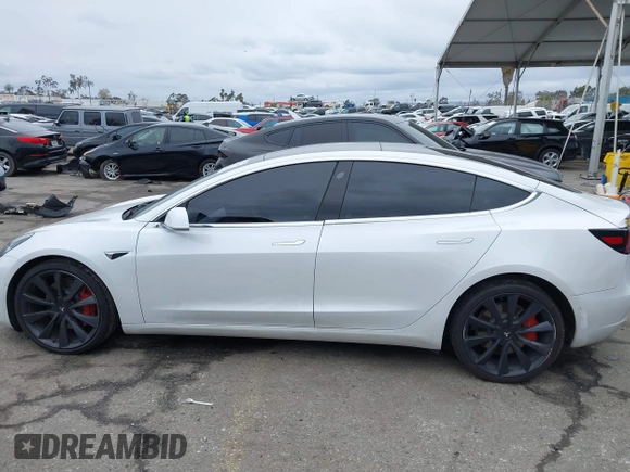 2020 Tesla Model 3 Performance z VIN 5YJ3E1EC4LF625109, wystawiony jako IAAI lot #41735149 z przebiegiem 95 010 mil mil oraz . Historia ofert i sprzedaży dostępna na DreamBid. Obrazek 15.