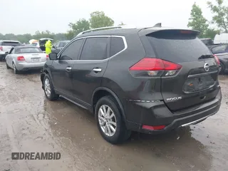 2017 Nissan Rogue SV with VIN KNMAT2MV1HP601384, listed as a IAAI auction lot 42454707 with 159,501 mi miles and . Bid and sale history available at DreamBid. Image 3.