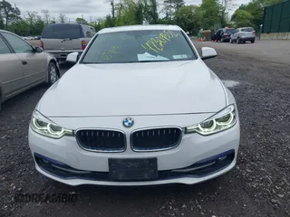2018 BMW 3 Series 330i xDrive with VIN WBA8D9C52JEM32318, listed as a IAAI auction lot 42309352 with 61,828 mi miles and . Bid and sale history available at DreamBid. Image 12.