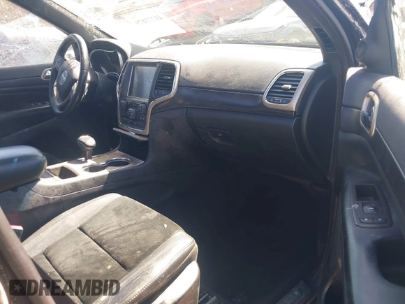 2014 Jeep Grand Cherokee Laredo with VIN 1C4RJEAG0EC580675, listed as a IAAI auction lot 41773879 with 127,714 mi miles. Bid and sale history available at carsss.com. Image 5.