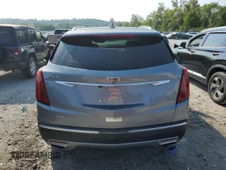 2023 Cadillac XT5 AWD Premium Luxury with VIN 1GYKNDR40PZ152982, listed as a Copart auction lot 69569914 with 24,829 mi miles and Salvage Title. Bid and sale history available at DreamBid. Image 6.