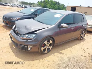2012 Volkswagen GTI Autobahn with VIN WVWHD7AJ4CW247658, listed as a IAAI auction lot 42400106 with 169,577 mi miles and . Bid and sale history available at DreamBid. Image 2.
