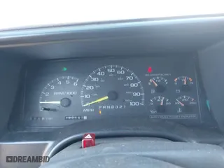 1999 Chevrolet Suburban with VIN 3GNEC16R0XG137834, listed as a IAAI auction lot 41853492 with 296,147 mi miles. Bid and sale history available at carsss.com. Image 7.