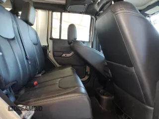 2018 Jeep Wrangler JK Unlimited Sahara with VIN 1C4BJWEGXJL889159, listed as a Copart auction lot 76523774 with 77,528 mi miles and Salvage Title. Bid and sale history available at carsss.com. Image 10.