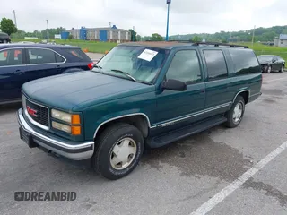 1996 GMC Suburban z VIN 1GKFK16ROTJ725925, wystawiony jako IAAI lot #42244433 z przebiegiem 123 837 mil mil oraz . Historia ofert i sprzedaży dostępna na DreamBid. Obrazek 2.