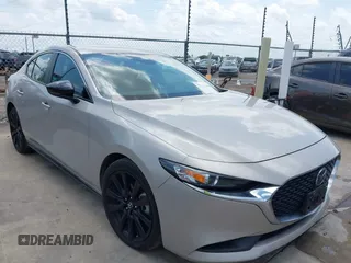 2024 Mazda 3 S Select Sport z VIN 3MZBPABM2RM426516, wystawiony jako IAAI lot #42433284 z przebiegiem 27 065 mil mil oraz . Historia ofert i sprzedaży dostępna na DreamBid. Obrazek 1.