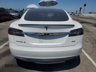 2013 Tesla Model S Performance с VIN 5YJSA1DP3DFP10567, выставлен на аукционе Copart как лот 58352955 с пробегом 128 438 миль миль и Списание • Salvage title. История ставок и продаж доступна на DreamBid. Изображение 6.