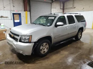 2013 Chevrolet Suburban LT with VIN 1GNSKJE76DR119873, listed as a Copart auction lot 53239445 with 197,172 mi miles and Salvage Title. Bid and sale history available at DreamBid. Image 1.
