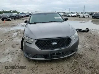 2014 Ford Taurus SE z VIN 1FAHP2D86EG143517, wystawiony jako Copart lot #51066975 z przebiegiem 134 892 mil mil oraz Szkoda całkowita • Salvage title. Historia ofert i sprzedaży dostępna na DreamBid. Obrazek 11.