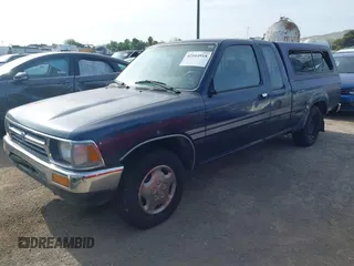 1994 Toyota 2WD Pickups DX with VIN JT4RN93P5R5103730, listed as a IAAI auction lot 42164918 with 396,623 mi miles. Bid and sale history available at carsss.com. Image 2.