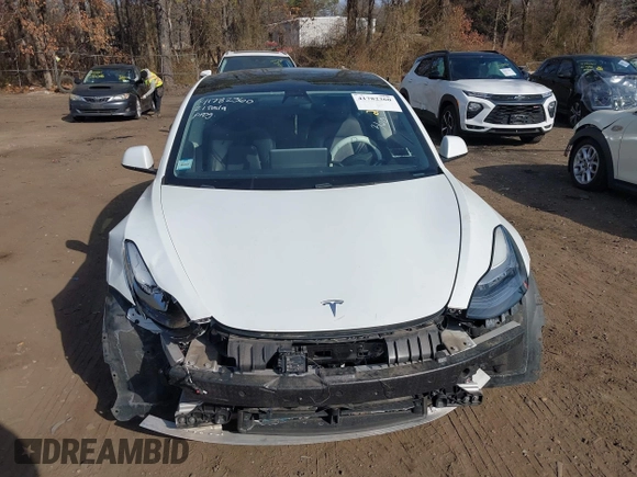 2021 Tesla Model 3 Long Range with VIN 5YJ3E1EB2MF858267, listed as a IAAI auction lot 41782360 with 79,671 mi miles and . Bid and sale history available at DreamBid. Image 12.