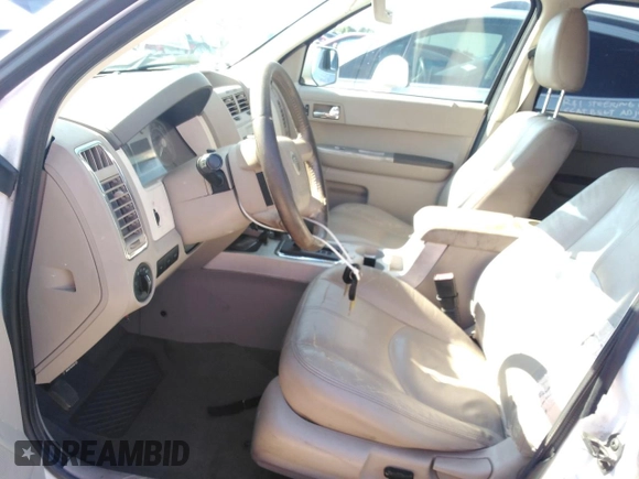 2008 Mercury Mariner Premier z VIN 4M2CU87128KJ53679, wystawiony jako Copart lot #54269815 z przebiegiem Nie podano mil oraz Szkoda całkowita • Salvage title. Historia ofert i sprzedaży dostępna na DreamBid. Obrazek 7.