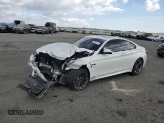 2015 BMW M4 with VIN WBS3R9C53FK334270, listed as a Copart auction lot 68763514 with 71,816 mi miles and Salvage Title. Bid and sale history available at carsss.com. Image 1.