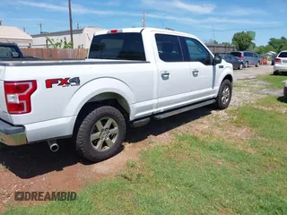 2018 Ford F-150 XL with VIN 1FTFW1E5XJKE02519, listed as a IAAI auction lot 42180274 with 184,101 mi miles. Bid and sale history available at carsss.com. Image 4.