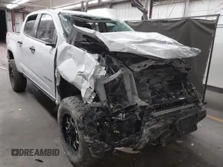 2021 Chevrolet Colorado 4WD Z71 z VIN 1GCGTDENXM1114914, wystawiony jako IAAI lot #42096272 z przebiegiem 78 203 mil mil oraz . Historia ofert i sprzedaży dostępna na DreamBid. Obrazek 1.