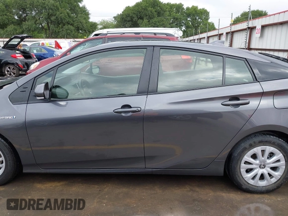 2022 Toyota Prius L Eco with VIN JTDKAMFU4N3183352, listed as a IAAI auction lot 42170623 with 52,244 mi miles and . Bid and sale history available at DreamBid. Image 15.