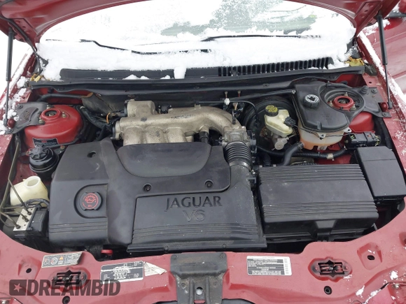 2003 Jaguar X-Type 2.5L Manual z VIN SAJEA51D63XC89273, wystawiony jako IAAI lot #41298544 z przebiegiem 124 400 mil mil oraz . Historia ofert i sprzedaży dostępna na DreamBid. Obrazek 10.