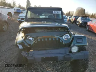 1998 Jeep Wrangler Sahara z VIN 1J4FY49S5WP798505, wystawiony jako Copart lot #88394465 z przebiegiem Nie podano mil oraz Szkoda całkowita • Salvage title. Historia ofert i sprzedaży dostępna na DreamBid. Obrazek 5.