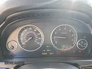 2014 BMW X5 sDrive35i with VIN 5UXKR2C56E0H33647, listed as a Copart auction lot 52218705 with 192,848 mi miles and Clean Title. Bid and sale history available at carsss.com. Image 9.