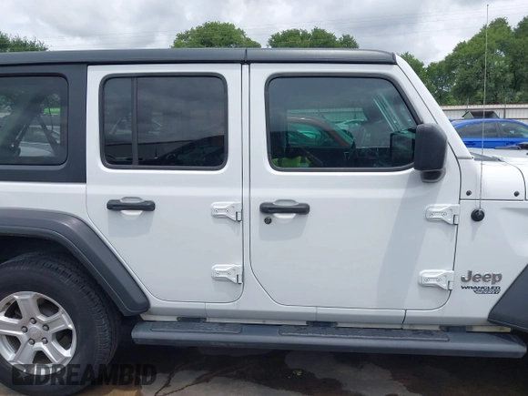 2019 Jeep Wrangler Unlimited Sport S with VIN 1C4HJXDN3KW689739, listed as a IAAI auction lot 42358604 with 73,271 mi miles and . Bid and sale history available at DreamBid. Image 14.