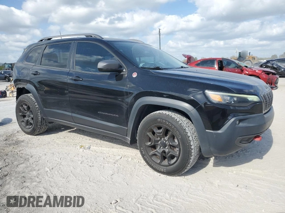 2019 Jeep Cherokee Trailhawk с VIN 1C4PJMBXXKD342371, выставлен на аукционе Copart как лот 55144715 с пробегом 78 433 миль миль и Списание • Salvage title. История ставок и продаж доступна на DreamBid. Изображение 4.