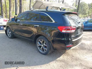 2016 Kia Sorento SX with VIN 5XYPKDA58GG127772, listed as a IAAI auction lot 42002092 with 138,367 mi miles and . Bid and sale history available at DreamBid. Image 3.