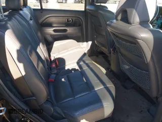 2007 Honda Pilot EX-L with VIN 5FNYF185X7B016807, listed as a IAAI auction lot 41759785 with 129,690 mi miles. Bid and sale history available at carsss.com. Image 8.