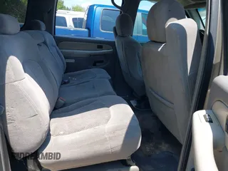 2001 Chevrolet Suburban LS z VIN 3GNEC16T11G222345, wystawiony jako IAAI lot #42289535 z przebiegiem Nie podano mil oraz . Historia ofert i sprzedaży dostępna na DreamBid. Obrazek 8.