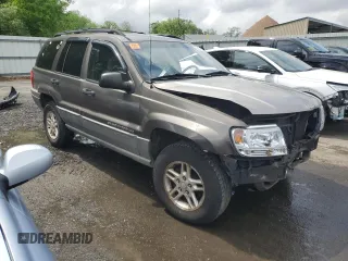 2000 Jeep Grand Cherokee Laredo с VIN 1J4G248S4YC299003, выставлен на аукционе Copart как лот 55937685 с пробегом Не указан миль и Списание • Salvage title. История ставок и продаж доступна на DreamBid. Изображение 4.