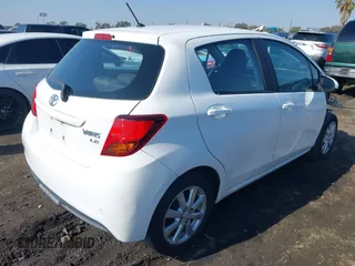 2015 Toyota Yaris L with VIN VNKKTUD30FA051732, listed as a IAAI auction lot 41449083 with 82,207 mi miles. Bid and sale history available at carsss.com. Image 4.