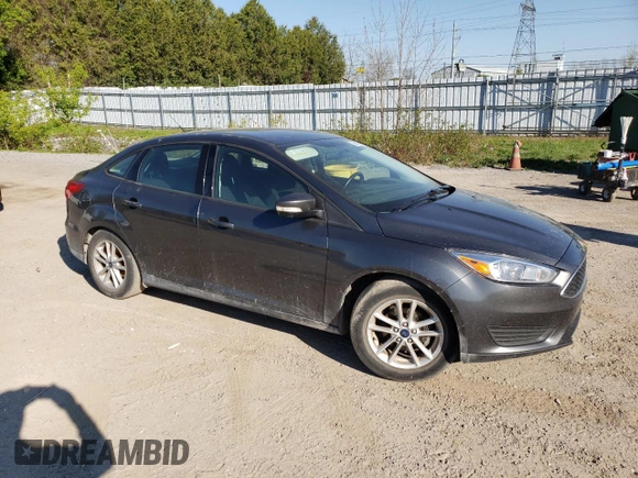 2018 Ford Focus SE z VIN 1FADP3FE4JL306237, wystawiony jako Copart lot #56482215 z przebiegiem 102 241 mil mil oraz Czysty tytuł • Clean title. Historia ofert i sprzedaży dostępna na DreamBid. Obrazek 4.