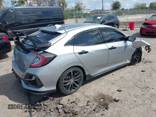 2021 Honda Civic Sport with VIN SHHFK7H43MU225961, listed as a IAAI auction lot 41721936 with 58,928 mi miles and . Bid and sale history available at DreamBid. Image 4.