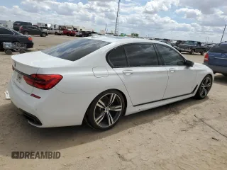 2018 BMW 7 Series 740i with VIN WBA7E2C51JG742075, listed as a Copart auction lot 65057923 with 0 mi miles. Bid and sale history available at carsss.com. Image 3.