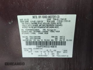 2012 Ford Taurus SEL with VIN 1FAHP2EW2CG140818, listed as a IAAI auction lot 42101815 with 55,323 mi miles and . Bid and sale history available at DreamBid. Image 9.
