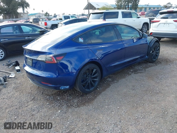 2020 Tesla Model 3 Standard Range Plus z VIN 5YJ3E1EA5LF708885, wystawiony jako IAAI lot #42172952 z przebiegiem 58 882 mil mil oraz . Historia ofert i sprzedaży dostępna na DreamBid. Obrazek 4.
