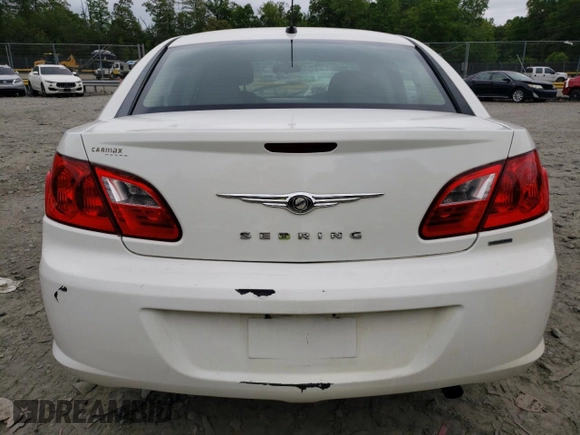 2010 Chrysler Sebring Touring z VIN 1C3CC4FB5AN192786, wystawiony jako Copart lot #56566445 z przebiegiem 194 869 mil mil oraz Szkoda całkowita • Salvage title. Historia ofert i sprzedaży dostępna na DreamBid. Obrazek 6.