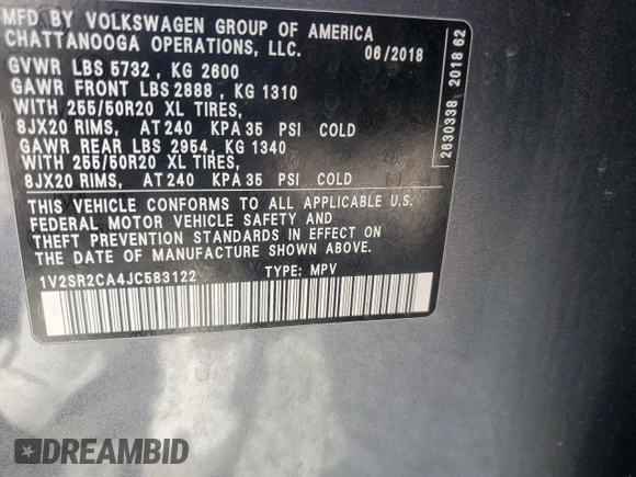 2018 Volkswagen Atlas SEL z VIN 1V2SR2CA4JC583122, wystawiony jako Copart lot #52748205 z przebiegiem 86 071 mil mil oraz Szkoda całkowita • Salvage title. Historia ofert i sprzedaży dostępna na DreamBid. Obrazek 13.