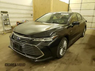 2021 Toyota Avalon Limited Hybrid z VIN 4T1CA1AB3MU001055, wystawiony jako Copart lot #62823372 z przebiegiem 14 776 mil mil oraz . Historia ofert i sprzedaży dostępna na DreamBid. Obrazek 2.