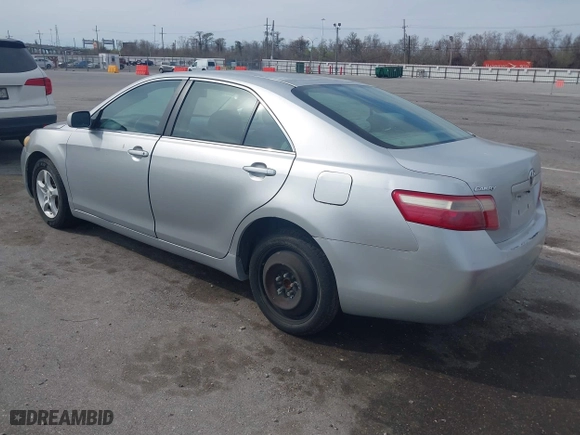 2007 Toyota Camry CE with VIN 4T1BE46K47U043586, listed as a IAAI auction lot 41698892 with 220,617 mi miles. Bid and sale history available at carsss.com. Image 3.