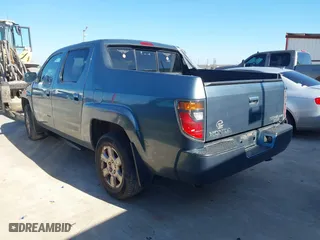 2006 Honda Ridgeline RTL with VIN 2HJYK16566H571367, listed as a IAAI auction lot 41342775 with 250,432 mi miles. Bid and sale history available at carsss.com. Image 3.