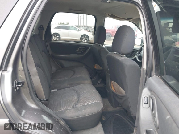 2005 Mazda Tribute S with VIN 4F2YZ04135KM05678, listed as a IAAI auction lot 42194083 with 283,488 mi miles and . Bid and sale history available at carsss.com. Image 8.
